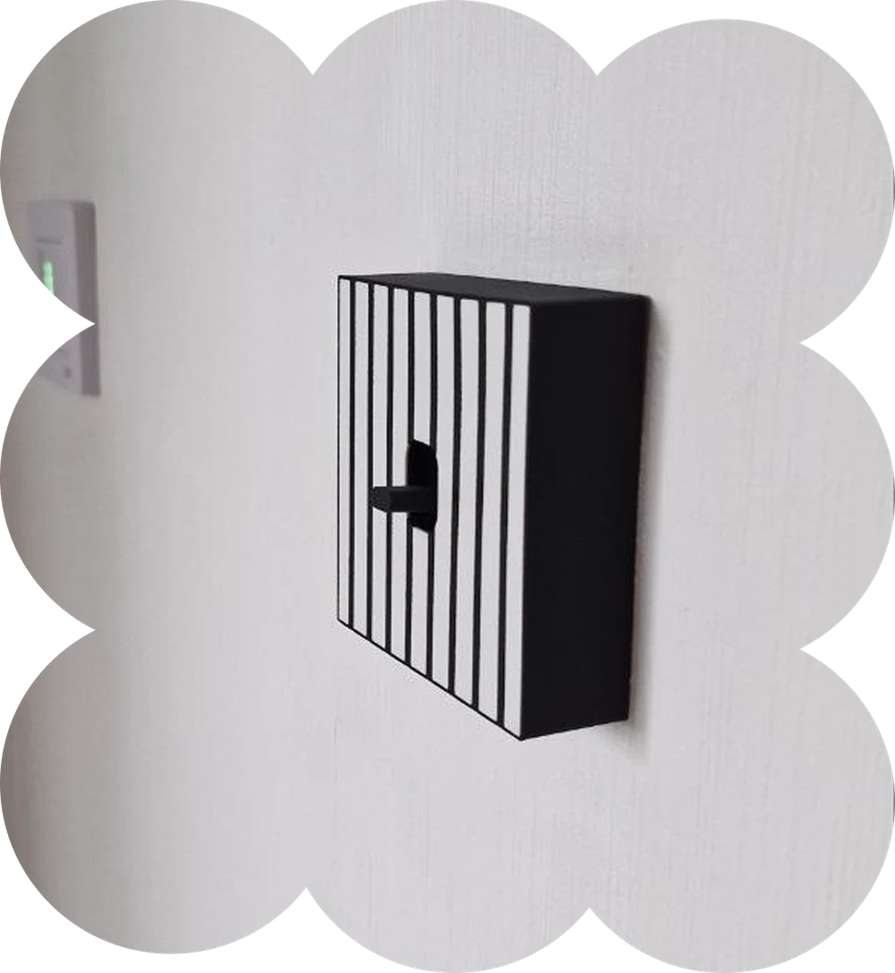 Black-and-white striped cover on a wall