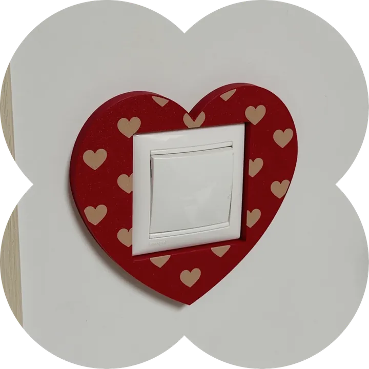 Red heart-shaped frame with light hearts