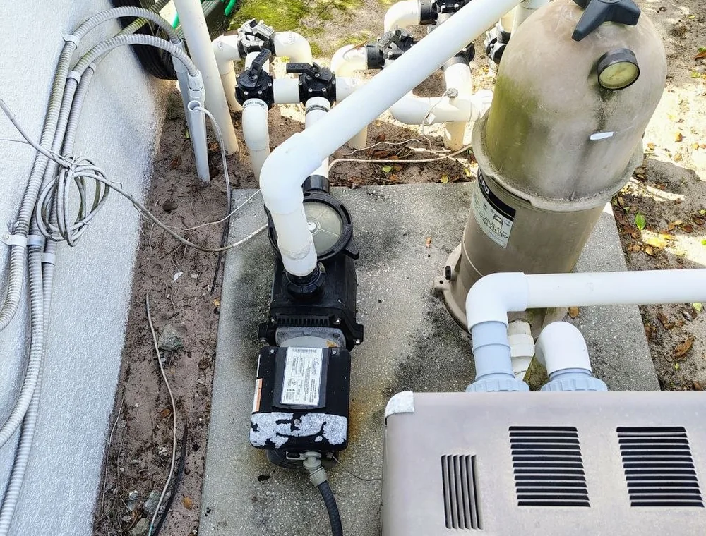 Old pool pump before replacement