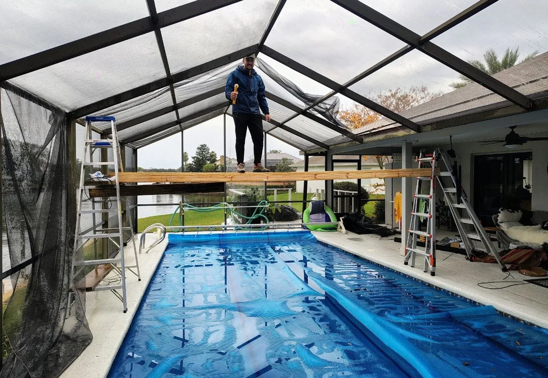 Florida pool screen enclosure with repaired screen panels